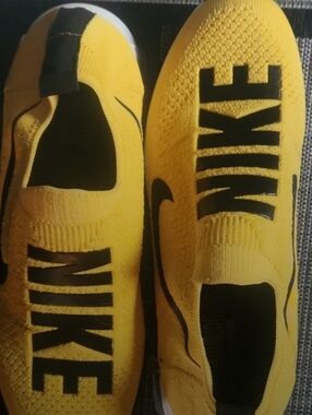 Nike Women's Yellow Slip-On Sneakers